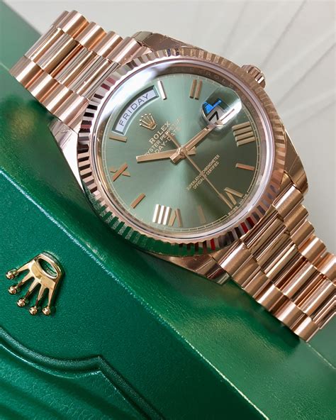 rolex day date gold green.